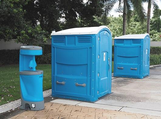 handicap/ada porta potties include wheels for easy transport, grab bars, and an accessible door