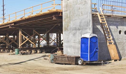 workers' rest area equipped with portable restrooms for added convenience